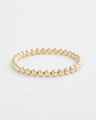 Small Beaded Gold Tone Stretch Bracelet